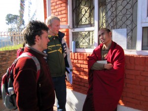 khenpo-sothob-davide-and-han Shedra students discussing with Khenpo Sönam Tobden